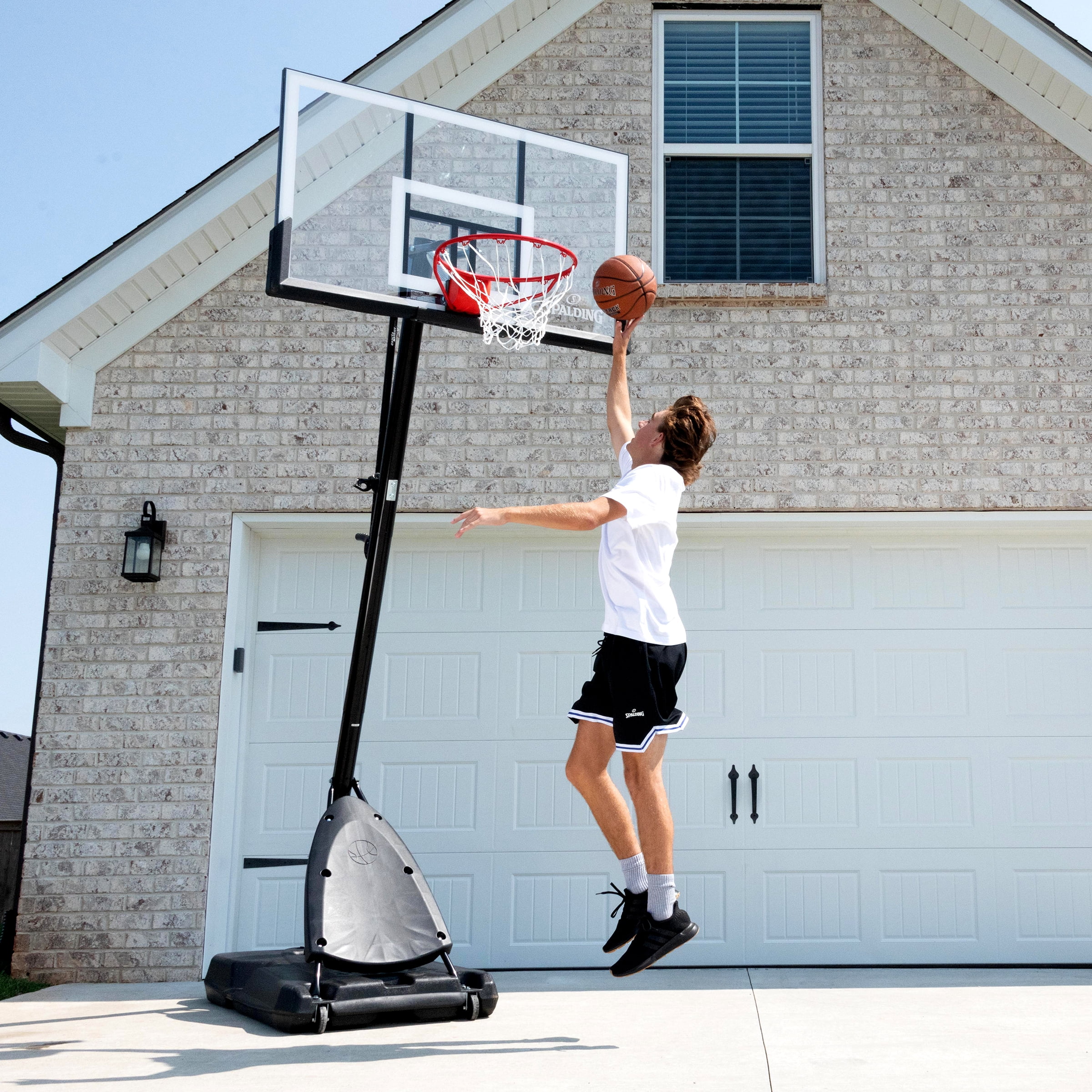 Spalding 54-Inch Portable Basketball Hoop with Shatter-Proof Polycarbonate Backboard, Adjustable ExactaHeight System & Pro Slam Rim-Outdoor Play